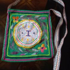 Peruvian Shipibo Ceremony Bag, Hand Embroidered From The Amazon Jungle It Can Be Used In Your Ceremony As A Medicine Bag, To Store Your Essential Items Such As Mapacho, Flowery Water And Rattle. As You Can See In The Images, Patterns Of The Shipiba Culture Are Embroidered. This Bag Is Embroidered By Hand By Peruvian Artisans From The Amazon Jungle Size 10x10 Inches Traditional Handheld Bag With Multicolor Embroidery, Traditional Multicolor Shoulder Bag With Removable Pouch, Traditional Multicolor Embroidered Handheld Bag, Embroidered Rectangular Shoulder Bag For Festivals, Rectangular Embroidered Shoulder Bag For Festivals, Green Handwoven Pouch Shoulder Bag, Artisan Green Rectangular Shoulder Bag, Handmade Bags For Festive Ceremonies, Traditional Green Pouch Bag