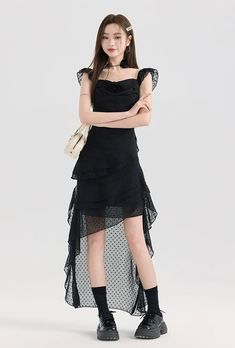 Embrace your edgy side with this Tiered Ruffle Midi Dress with Floral Detail that masterfully balances nonchalance with a touch of sophistication. Crafted for modern aesthetics, this midi dress features delicate ruffles that cascade down for an eye-catching effect. The square neckline and sleeveless design add a contemporary touch, while the A-line silhouette and high waist offer a flattering fit. The dress's solid color serves as a canvas for personal expression, crafted from a lightweight fabr Elegant Ruffle Dress With Layered Hem For Spring, Flirty Tiered Skirt Evening Dress, Fitted Ruffle Dress With Layered Hem For Party, Elegant Party Mini Dress With Layered Hem, Summer Midi Dress With Ruffle Hem For Prom, Elegant Ruffle Dress With Tiered Skirt For Date Night, Elegant Fitted Dress With Layered Hem, Fitted Midi Prom Dress With Ruffle Hem, Elegant Tiered Ruffle Dress For Date Night