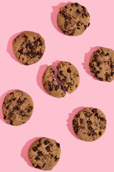 chocolate chip cookies on a pink background