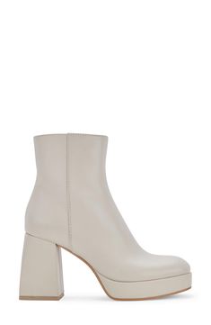 A flared heel and chunky platform bring a boost of glam to a side-zip bootie designed in clean monochrome. 4" heel; 2" platform Leather upper/synthetic lining/rubber sole Imported Chunky Platform, Bootie, Side Zip, Nordstrom Rack, Rubber Sole, Ankle Boot, Leather Upper, Nordstrom, Bring It On