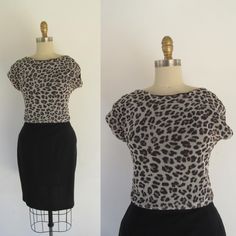 90s leopard print ruched short sleeve blouse. Beige background with shades of tan, black, and gray. Ruched/gathered sides. Fabric is net with a black lace lining. Both fabrics are a bit see-through, but layered, the top has minimal transparency. There is no seem at hem, just a raw edge. Super cute No content label present. Probably poly, nylon, or a blend thereof. Made in El Salvador for SWEET PEA.  Label size M  Measured flat, unstretched--has light to moderate stretch Please compare measuremen Cheap Leopard Print Short Sleeve Top, Trendy Short Sleeve Leopard Print T-shirt, Fitted Leopard Print Short Sleeve T-shirt, Leopard Print Relaxed Fit T-shirt With Crew Neck, Cotton Leopard Print T-shirt With Graphic, Shell Tops, Beige Background, Short Sleeve Blouse, Black Lace