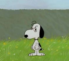 a cartoon dog standing on top of a lush green field