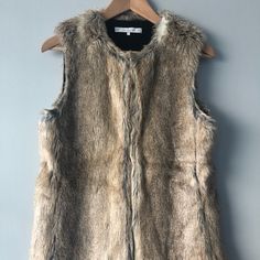 Zara Trafaluc Outerwear Faux Fur Vest. Size S. Lined, Hook Closure (3 Hooks) And Pockets. Super Comfortable, Warm And Stylish! Brown Fur Coat With Faux Fur Lining For Spring, Spring Brown Fur Coat With Faux Fur Lining, Brown Faux Fur Lined Coat For Spring, Zara Beige Outerwear With Faux Fur Lining, Zara Faux Fur Outerwear With Fur Trim, Zara Faux Fur Outerwear, Faux Fur Vest, Faux Fur Vests, Zara Jackets