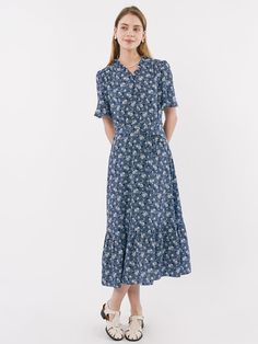 Editor's NoteThis is a long dress with a gentle flower print that gives a feminine feel. A slim fit and flared skirt creates a feminine silhouette.- Ruffles on the neck and sleeves- Can be opened and closed with a zipper on the back- There is a string to tie a ribbon on the side of the waist- Available in 2 colors: Blue, RedMeasurements (in.)55 / 66- Length: 46.85 in. / 47.64 in.- Shoulder: 14.17 in. / 14.57 in.- Bust: 38.98 in. / 40.94 in.- Waist circumference: 28.35 in. / 30.31 in.- Sleeve: 10.63 in. / 10.63 in.Composition & Care- 100% Polyester- Please check the care labelDesigner- by OLIVE DES OLIVE Modest A-line Dress With Floral Print, Modest Short Sleeve Floral Dress With Ditsy Print, Modest Knee-length Midi Dress With Ditsy Floral Print, Modest Fitted Floral Print Dress, Modest Fitted Floral Dress For Garden Party, Modest Floral Print Midi Dress For Daywear, Modest Midi Dress With Floral Print For Daywear, Modest Knee-length Floral Print Dress, Feminine Floral Print Dress For Work