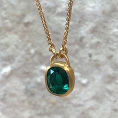 EMERALD PENDANT WRPPED IN 22K GOLD , 1.12 CARAT, DOUBLE ROSE CUT, ON 18K GOLD CHAIN • DESIGNED AND HAND FORGED IN NEW YORK • LENGTH: 18.5 INCHES   Please email info@elihalili.com or call the studio at 212-941-7979 for any inquiries. Gold Emerald Pendant Necklace, Emerald Pendant Necklace, Double Rose, Emerald Necklace Pendant, 18k Gold Chain, Emerald Pendant, Ruby Sapphire, Ancient Coins, Emerald Jewelry