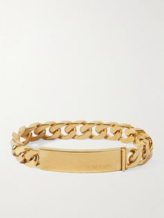 Whether you're in a crisp suit or cosy sweater, TOM FORD's chain bracelet is an easy way to refine an outfit. It's made from gold-plated brass and features a nameplate with discreet logo-engraving in the bottom corner. Formal Yellow Gold Bracelets With Gold-tone Logo, Luxury Brass Bracelets With Polished Finish, Luxury Tarnish Resistant Brass Gold Bracelet, Luxury Tarnish-resistant Brass Bracelet, Tom Ford Collection, Cosy Sweater, Tom Ford Bag, Ford Logo, Luxury Sneakers