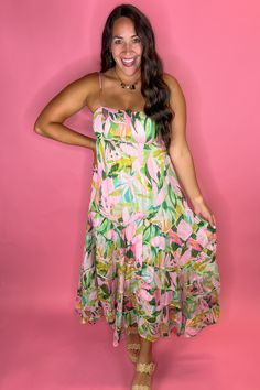 Gorgeous tropical maxi dress with a sparkle metallic look to it! Zipper in the back Lined FIT: True to size but no stretch! So size up if in between sizes. Model is a size 8, 36DD wearing a large. 100% Polyester Sleeveless Tropical Print Maxi Dress For Party, Pink Maxi Dress For Summer Parties, Tropical Multicolor Midi-length Maxi Dress, Summer Party Maxi Dress With Tropical Print, Tropical Print Sundress For Party, Party Tropical Print Maxi Sundress, Chic Tropical Print Maxi Dress For Summer Parties, Tropical Print Sundress Maxi Dress For Parties, Party Sundress With Tropical Print