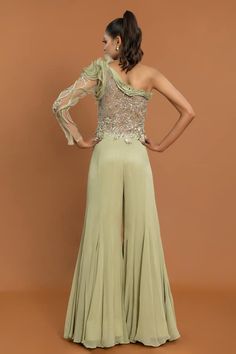 Green padded jumpsuit with thread embroidered floral applique motifs highlighted by sequins and fabric ruffles. - Aza Fashions Applique Jumpsuit, Fabric Ruffles, Embellished Jumpsuit, Jumpsuit For Women, Jumpsuit Pattern, Green Jumpsuit, Beaded Neckline, Fashion App, Floral Applique