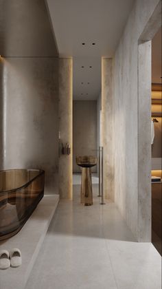 an elegant bathroom with marble walls and flooring