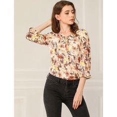 The elegant floral pattern adds dramatic styling to the semi-sheer 3/4 sleeve blouse. Full of romantic charm, this lightweight blouse is accented with a ruffle sleeve and a tie v-neck. An elegant tie-neck and half sleeves with elastic cuffs enhance the casual softy grace of the floral blouse in a loose H silhouette. Wear it with open-toe sandals and casual pants for an effortlessly feminine look. Women's Workwear Fashion, Floral Bow Tie, Coachella Fashion, Casual Work Outfit, Women's Blouses, Spring Outfits Women, Fabric Floral, Fashion Spring, Womens Fashion For Work