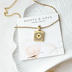 A Hmong-inspired Motif Pendant Necklace. We also have a double layer style. Check our store or click link here: ( https://rootsandloveco.etsy.com/listing/1672457087)  Details: You will receive one necklace  Gold Plated Over Stainless Steel Hypoallergenic  Lead and Nickel Free  Size: 15 x 15mm Chain length: 16 inches plus 2 inches extender SHIPPING & PACKAGING Free standard shipping on orders over $60 Use code SHIPFREE60 at check out Our jewelries are well packaged with care and will be shipped o Hmong Modern Jewelry, Hmong Jewelry, Hmong Necklace, Hmong Embroidery, Shipping Packaging, Elephant Art, Layer Style, Grad Gifts, Ethnic Jewelry