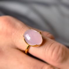 D E T A I L S - Material: 925 Sterling silver Stone: Pink Chalcedony Stone Shape: Oval Stone Size: 10x14mm The fit: True to US ring size Finish: Gold Plated to a high shine S H I P P I N G & P R O D U C T I O N - My current production time is 2-6 business days, which means after those days are up, your order ships! I make everything custom to order, by hand, but I promise you it's worth the wait! R U S H - M Y - O R D E R - If you're in a rush to get your pretty new pieces, please send me a Fine Jewelry Oval Stackable Rings As Gift, Polished Finish Rings For Gift, Open Crystal Ring With Polished Finish As Gift, Oval Stackable Rings For Gift, Faceted Stackable Rings Fine Jewelry Gift, Faceted Stackable Rings As Fine Jewelry Gift, Faceted Stackable Rings For Gifts, Fine Jewelry Hallmarked Crystal Ring Gift, Gift Crystal Ring Hallmarked Fine Jewelry