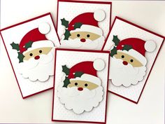 four christmas cards with santa's hat and holly