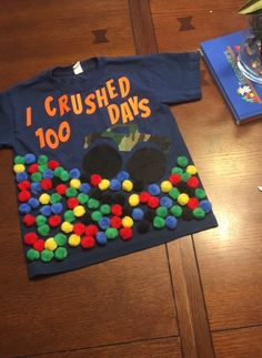 a child's t - shirt that says i crushed 100 days on it