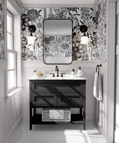 a black and white bathroom with floral wallpaper on the walls, two sinks and a large mirror