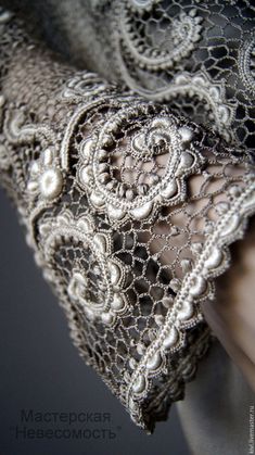 an image of a woman's dress with lace on it