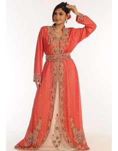 Peach Georgette Hand Zari Embroidery Party Wear Kaftan Right side and both sleeve zari work Back close with loop, button & zip, easy to wear Dress belongs to the zari embroidery work with glass stone at the front and sleeves Hijab and band shown in the image can be bought separately Fabric: GeorgetteCare: Mild machine wash/ hand Cold Wash/ Dry cleanWe request customers to carefully choose the correct size and dress length referring to our size chart Diwali Reception Kaftan With Resham Embroidery, Traditional Pink Kaftan For Wedding, Festive Pink Kaftan For Reception, Eid Floral Embroidered Kaftan For Reception, Eid Reception Kaftan With Floral Embroidery, Elegant Kaftan For Diwali Reception, Zari Work Kaftan For Diwali Reception, Reception Kaftan With Zari Work For Diwali, Pink Embroidered Traditional Kaftan