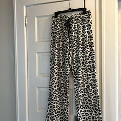 Get A Little Fiesta In These Cozy Tiger Print Jammie Pants. Washed Never Worn Condition. Has Like A Brushed Feel On The Outside. Soft And Cozy. Lightweight. Elastic Drawstring Waist. About 38 1/2” Long White Relaxed Fit Bottoms For Sleepover, Relaxed Fit White Bottoms For Sleepover, Black Bottoms For Sleepover, White Wide Leg Sleepwear With Elastic Waistband, White Stretch Pants For Sleep, White Sleepwear With Elastic Waistband And Wide Leg, White Wide Leg Sleep Pants, White Wide Leg Sleep Bottoms, White Stretch Pants For Pajama Party