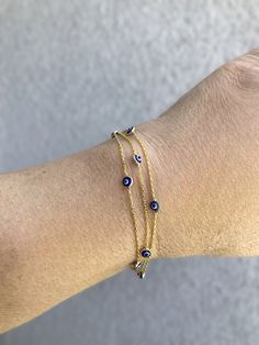 Dainty Blue Bangle Jewelry, Dainty Blue Bangle, Elegant Blue Bracelets With Adjustable Chain, Dainty Blue Bracelet With Adjustable Chain, Handmade Elegant Evil Eye Bracelet, Dainty Blue Round Evil Eye Bracelet, Elegant Blue Evil Eye Bracelet With Adjustable Chain, Elegant Blue Sterling Silver Evil Eye Bracelet, Lock Bracelet