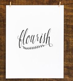 a piece of paper with the word flourish written in cursive writing on it