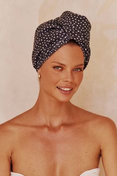 This turban-styled navy and white polka dot wrap hair towel dries hair in half the time than a regular towel and minimizes blow dry time to protect your hair from heat damage. Made of lightweight luxury microfiber that is gentle on delicate hair fibers, to minimize friction and frizz. Generous in size, this super absorbent towel holds almost 5x its weight in water. The button closure stays put so that you hair is secured. Keeps hair off face when applying makeup. How to wear? Its just as easy to Towel Turban, Clever Inventions, Mane Addicts, Towel Dry Hair, Hair Towel Wrap, Wrap Hair, Applying Makeup, Towel Wrap, Turban Style