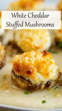 white cheddar stuffed mushrooms with cheese on top