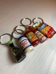 a key chain with some condiments on it