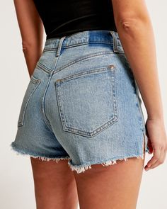 Embrace the summer with style in the Abercrombie & Fitch Women's Curve Love High Rise Mom Shorts. These shorts are designed specifically to flatter with a high-rise waist and a relaxed fit through the hip and thigh, ensuring no waist gap and optimum comfort.

- Size: 36
- Color: Light Medium Wash
- Material: Body - Cotton, Elastane; Pocket - Blend
- Gender: Female
- Inseam: 2.5 inches (6.25 cm)
- Features: Frayed hem, vintage stretch denim

Perfect for sunny days out or casual gatherings, these Relaxed Fit Shorts With 5-inch Inseam And Belt Loops, Relaxed Fit Bottoms With Comfort Waistband, Short Length, Relaxed Fit Bottoms With Comfort Waistband, Fitted High Rise Jean Shorts For Everyday, Fitted High-rise Jean Shorts For Everyday, Fitted Straight Leg Jean Shorts For Everyday, Everyday Mid-rise Bottoms With Comfort Waistband, Fitted High Rise Shorts For Everyday, Everyday High Rise Fitted Shorts