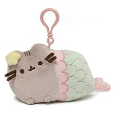 a stuffed animal keychain with a cat on it