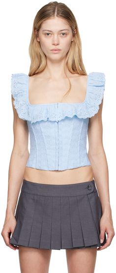 Cotton broderie anglaise corset-style tank top. Cutouts, embroidered detailing, and boning throughout. · Ruffled trim at square neck · Hook-eye closure at front · Curved hem · Lace-up closure at back · Full plain-woven cotton lining Supplier color: Angel blue Spring Square Neck Top With Broderie Anglaise, Spring Sleeveless Ruffled Corset, Fitted Ruffled Tank Top For Daywear, Fitted Ruffle Tank Top For Daywear, Spring Square Neck Corset, Fitted Sleeveless Broderie Anglaise Top, Corset Tank Top, Random Dump, Frilly Blouse