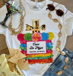 Ole' get ya CoCo Cinco de Mayo t-shirt today! Haute Couture is always fun to add to any #OOTD. This shirt is a must for girls trips, day trips or to sleep in. And for heaven’s sake, please tag us in your fabulous designer inspired t-shirt, so we can see your adventures! The gold bow accent adds a bit of elegance to this popular shirt design. Add your SIZE in the order not box that pops up at the end of order! Available Sizes Small Medium Large X Large 2X Large Details • 50% cotton, 50% polyester Fun Shirt For Cinco De Mayo, Popular Shirt Designs, Teacher Monogram, Girls Trips, Monogram Shirts, Popular Shirt, Unisex Style, To Sleep, Girls Trip