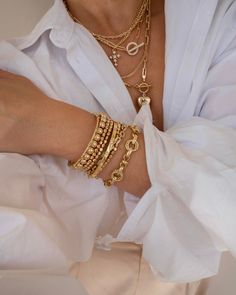 We love throwing on chunky chains to elevate our everyday stack, and the Atlas bracelet is the perfect piece to add to your collection. We love the different textures and patterns on this bracelet - dress it up for a night out, or dress it down with your favorite sweater. 18k Gold Plated Dimensions: S/M: fits wrist size up to 6.25" || M/L: fits wrist sizes up to 7" Please remove piece prior to water exposure Chic Stackable Metal Bracelets, Trendy Chunky Link Bracelets, Everyday Chunky Chain Link Bracelet, Modern Chunky Bracelets, Trendy Adjustable Chain Bracelets For Layering, Trendy Chunky Chain Bracelet Gift, Trendy Chunky Chain Bangle Bracelet, Chic Chain Bangle Bracelet, Modern Chunky Chain Bracelets For Party