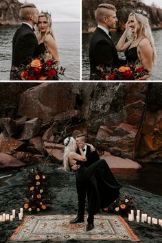 a man and woman standing next to each other in front of the ocean with candles