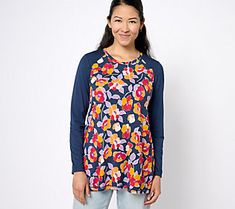 Ready to play around with prints? This Rayon 230 top mixes a fab floral with solid sleeves for a colorfully coordinated look. From LOGO by Lori Goldstein®. Blue Raglan Sleeve Tops For Spring, Casual Multicolor Floral Print Top, Spring Cotton Top With Raglan Sleeves, Spring Cotton Raglan Sleeve Tops, Multicolor Print Long Sleeve Relaxed Fit Top, Multicolor Print Long Sleeve Top With Relaxed Fit, Relaxed Fit Long Sleeve Multicolor Print Top, Multicolor Print Tops For Fall, Relaxed Fit, Relaxed Fit Multicolor Print Top For Fall