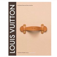 the louis vuitton book is shown with two handles on each side of it