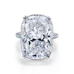 Cushion-cut diamond set in platinum pavé ring. 22.84 carat GIA E SI1 Luxury Platinum Cluster Ring With Halo Setting, Honey Ideas, Harry Winston Engagement, Dig Jewelry, Favorite Engagement Rings, Cushion Diamond Ring, Expensive Jewelry Luxury, Mercedes Maybach, Beautiful Diamond Rings