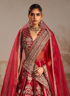 Embark on a journey of love with this red lehenga set, inspired by persian culture. The intricate tree motifs symbolize the emotions of a bride, elegantly crafted on a vibrant red lehenga, paired with a matching blouse and a scalloped-edged dupatta. Red, representing love and new beginnings, adds timeless elegance. Style with traditional accessories and step into your new life with grace, embracing the cultural significance of this enchanting ensemble. Palm Tree Embroidery, Traditional Accessories, Red Sari, Journey Of Love, Indian Bridal Lehenga, Persian Culture, Red Lehenga, Indian Bridal Dress, Elegance Style