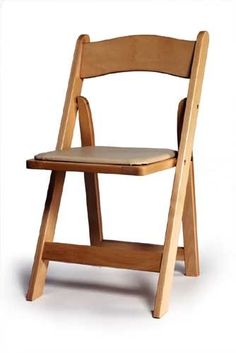 a wooden folding chair sitting up against a white background