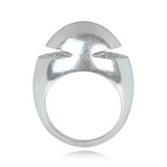 A Bulgari ring handcrafted in 18k white gold. The mounting is dome-shaped, with grooves in the sides set with half-moon designs of round brilliant cut diamonds. The inside of the ring is signed BVLGARI. This ring was made in Italy, circa 1965.
The dimensions of this ring are approximately 14.05mm x 20.31mm.
This ring can be resized.
If you have any questions about this Bulgari ring, please feel free to contact us. Domed Silver Diamond Jewelry, Silver Domed Diamond Jewelry, Silver Dome Ring Fine Jewelry, Luxury Silver Dome Ring With Diamond Cut, Modern Dome Ring With Diamond Accents, Luxury White Gold Dome Ring In Platinum, Luxury Silver Dome Ring With Single Cut Diamonds, White Gold Dome Ring With Diamond, Silver Dome Ring With Diamond Accents