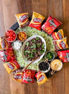 a platter filled with taco salad and chips