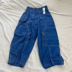 Urban Outfitters Blue Rih Baggy Carpenter Pants Size 2 Condition: Nwt Color: Blue Details : - Contrast Stitching - Comfy Extra: - I Ship Between 1-2 Days Blue Baggy Parachute Pants With Pockets, Blue Relaxed Fit Cargo Pants With Pockets, Casual Blue Pants With Cargo Pockets, Blue Baggy Cargo Pants With Pockets, Baggy Blue Cargo Pants With Pockets, Baggy Blue Cargo Pants, Blue Relaxed Fit Utility Pants, Blue Relaxed Fit Cargo Pants For Work, Blue Relaxed Fit Cargo Pants