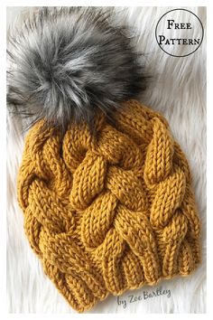 a knitted hat with a pom - pom on top