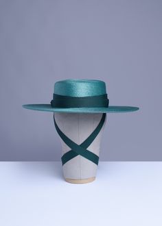 This full-size teal green faux straw hat is trimmed with complimentary green grosgrain ribbon. Ribbon ends are trimmed with matching green tassels. Nice and structured, not floppy, with a wide brim. Inspired by my dear friend Samantha Rei. Fits up to a 23" head size. Material: 100% Polypropylene Crown Width: 6.5 inch Crown Height: 3.25 inch Brim Width: 4 inch Ships in a hat box. This item is OVERSIZED so unfortunately International and Priority shipping will be quite high. All pieces are MADE TO Gothic Cottagecore, Ribbon Ends, My Dear Friend, Hat Box, Green Ribbon, Wide Brimmed Hats, Jewel Tones, Teal Green, Wide Brimmed