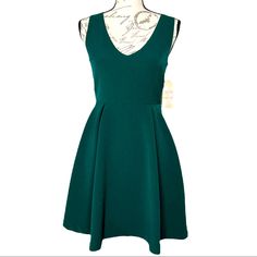 Beautiful Emerald Green Gianni Bini V Neck Sleeveless Dress With Back Center Zipper And Hook And Eye Closure. Excellent Condition. New With Tags. Size S Approximate Measurements Laying Flat Pit To Pit- 15” Waist- 13” Length- 33” Green Sleeveless Mini Dress For Date Night, Green Stretch Sleeveless Dress For Date Night, Green Fit And Flare A-line Sleeveless Dress, Green Stretch V-neck Sleeveless Dress, Green V-neck Stretch Sleeveless Dress, Green V-neck Sleeveless Stretch Dress, Green Sleeveless Lined Mini Dress, Green Sleeveless Fit And Flare A-line Dress, Green A-line Sleeveless Dress Fit And Flare