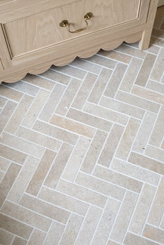 Dijon tumbled metro tiles laid in a herringbone pattern, in a newly renovated bathroom. Glazed Brick Tiles, Cream Tiles, Indoor Tiles, Cream Tile, Porcelain Tile Bathroom, Limestone Tiles, Statement Tiles, Glazed Brick