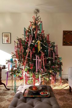 a decorated christmas tree in a living room