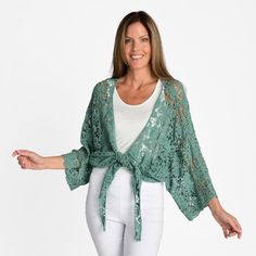 An Indigo Thread favorite crochet design, now in a tie front cardigan silhouette. With the loose dolman sleeves, this light layering piece is so easy to put on over tops, dresses, or even swimwear. Made of 100% Cotton, this casual cardigan comes in fun boho colors. Simplified to two size options, it offers an easy relaxed fit. A throw on and go outfit completer! Chic V-neck Shrug For Spring, Chic Open Knit Cover-up For Spring, Spring Open Knit Cover-up In One Size, Spring Layering Open Knit Cover-up, Spring Open Knit One-size Cover-up, Chic Lace Cardigan, Casual Spring Cardigan With Crochet Lace, Casual Open Knit Shrug For Spring, Casual V-neck Shrug For Spring