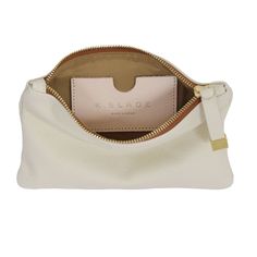 The smaller of our organizational pieces, the Tip Pouch in cream is an easy addition to your travel lineup, and it fits perfectly in our larger handbags. We recommend it for electronic accessories, small cosmetics, jewelry and chargers during travel. Chelsea Gray, Clutch Pouch, Large Handbags, Small Pouches, Drawstring Pouch, It Fits, Pencil Pouch, Zip Wallet, Custom Bags