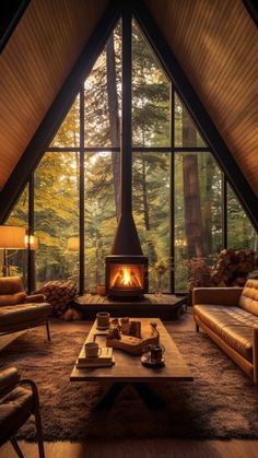 a living room filled with furniture and a fire place in the middle of a forest