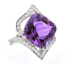 14.70 Carats Natural Amethyst and Diamond 14K Solid White Gold Ring Suggested Replacement Value: Approx. $5,500.00 Total Natural Square Cushion Shaped Amethyst Weights: Approx. 14.00 Carats Amethyst Measures: Approx. 15.00 x 15.00mm Natural Round Diamonds Weight: Approx. 0.70 Carats (color G-H / Clarity SI1-SI2) Ring total weight: Approx. 12.0 grams Disclaimer: all weights, measurements and colors are approximate and may vary slightly from the listed dimensions or as seen in the image. All pictu Luxury White Gold Amethyst Ring With Gemstone Accents, Luxury White Gold Amethyst Ring With Diamond Accents, Luxury Purple Platinum Rings, Luxury Purple Amethyst Platinum Ring, Luxury Purple Amethyst Ring In Platinum, Luxury Platinum Amethyst Ring With Brilliant Cut, Formal Purple Amethyst Ring With Diamond Accents, Luxury Purple Amethyst Ring For Formal Occasions, Fine Jewelry Platinum Amethyst Ring